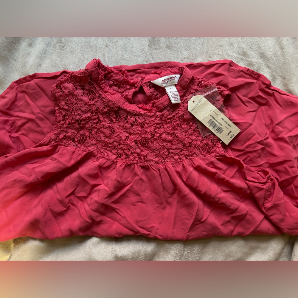 Darker pink sleeveless blouse. Size L. New without tags.